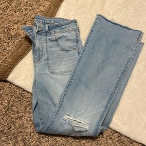 Women’s American Eagle light wash, raw hem, split bottom, size 6 regular flare.